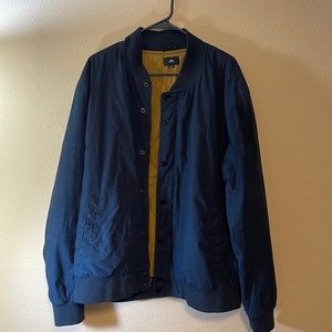 OBEY Black Bomber jacket with mustard color lining